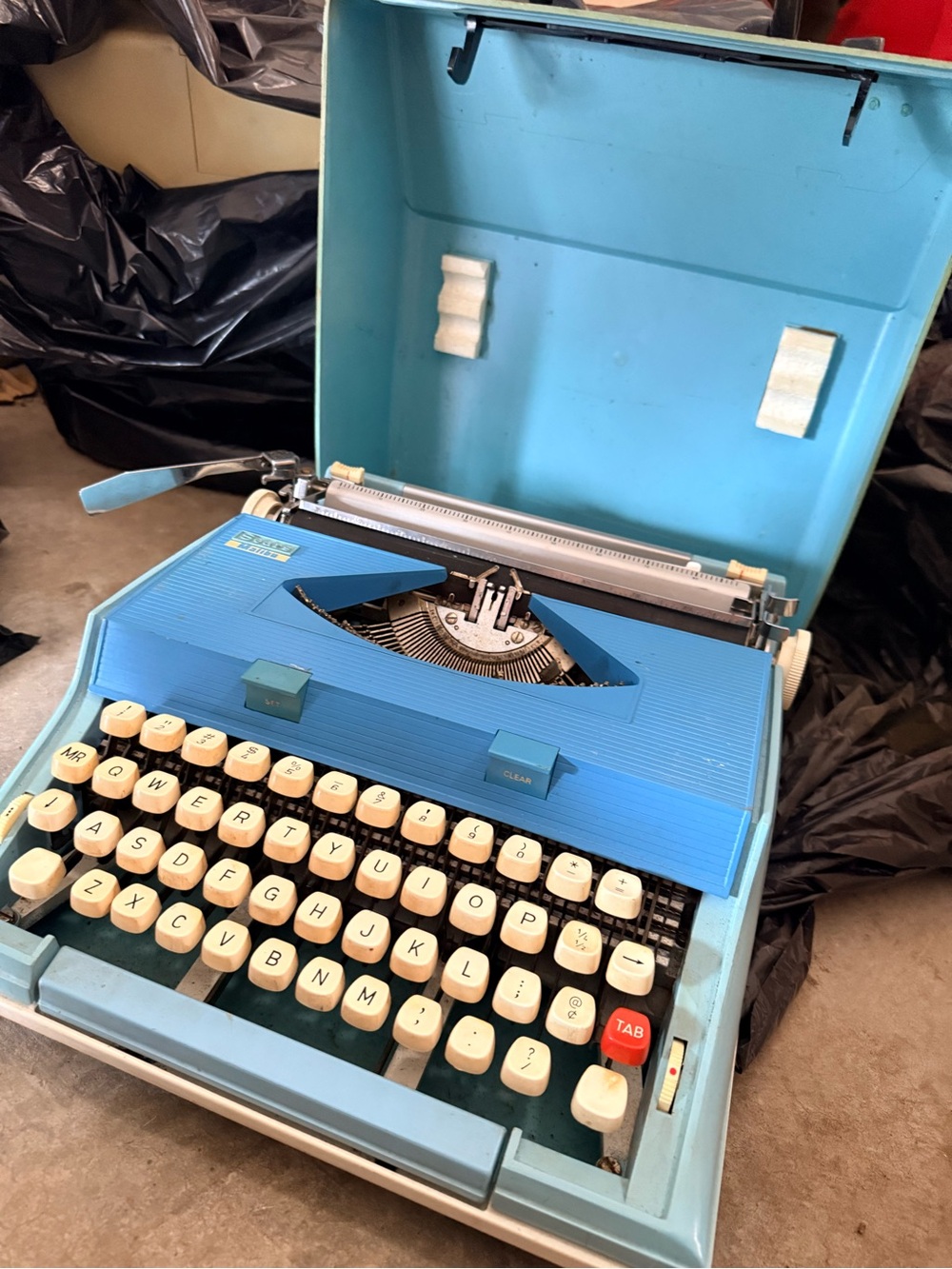 Sears Malibu Blue Portable Typewriter with Cream Keys